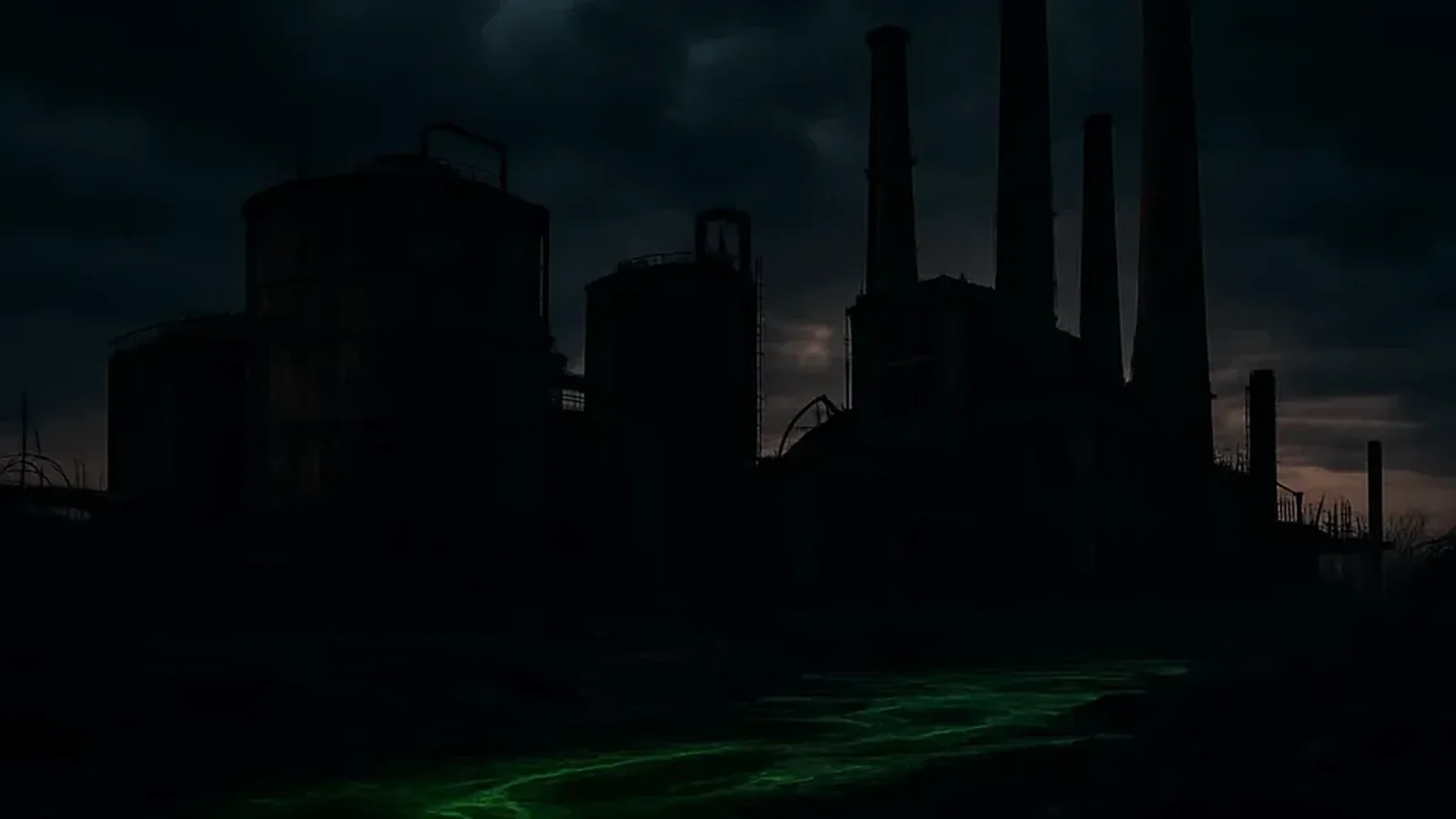 Napuštena industrijska fabrika sa visokim dimnjacima u Loznici, ispred koje protiče zagađena rečica sa zeleno-crvenim odsjajem – simbol industrijskog zagađenja Viskoze i Drine.